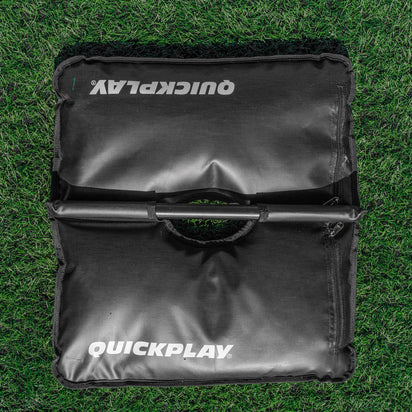 Black QuickPlay dual sandbag on grass