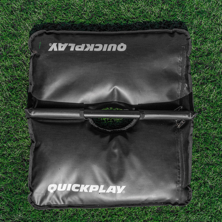 Black QuickPlay dual sandbag on grass