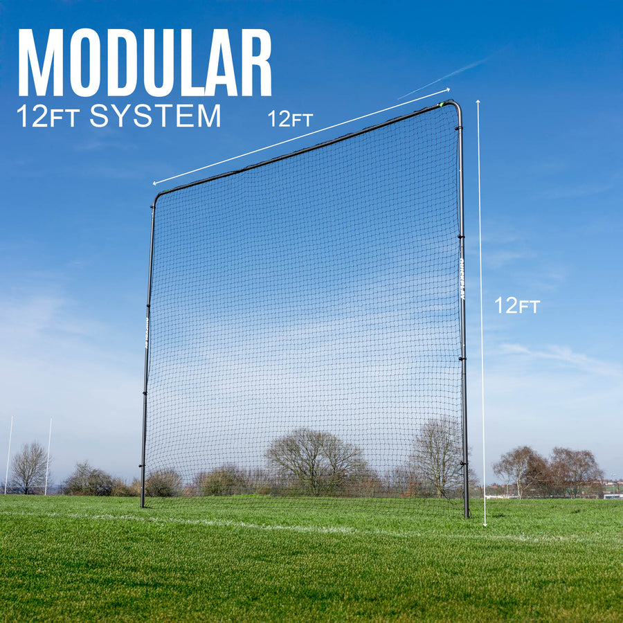 12-foot modular barrier net system on a grassy field with clear blue sky