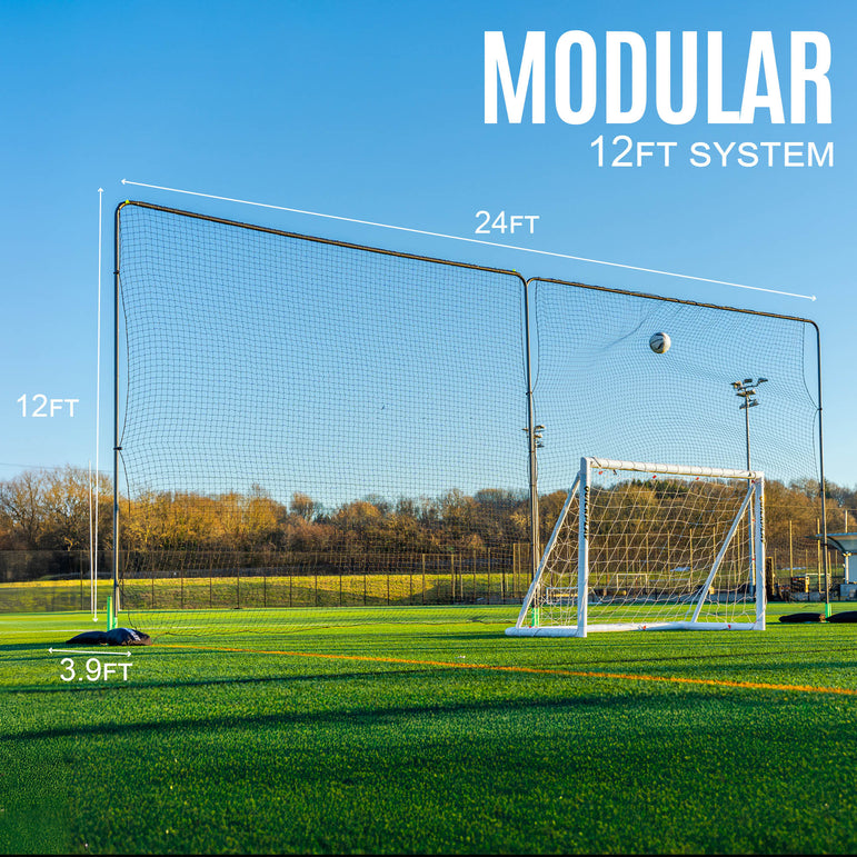 Modular 12ft barrier net system on a sports field with clear blue sky