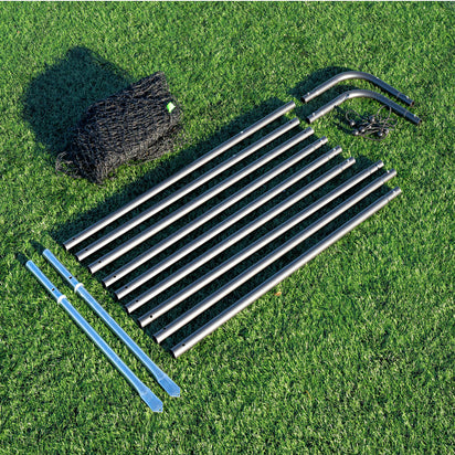 Metal barrier net frame components on grass