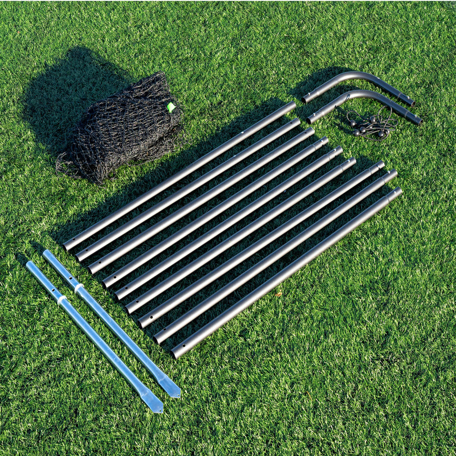 Metal barrier net frame components on grass