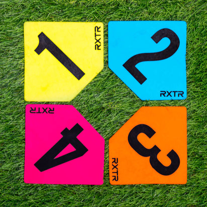 Four colorful numbered markers with 'RXTR' branding on a grass background