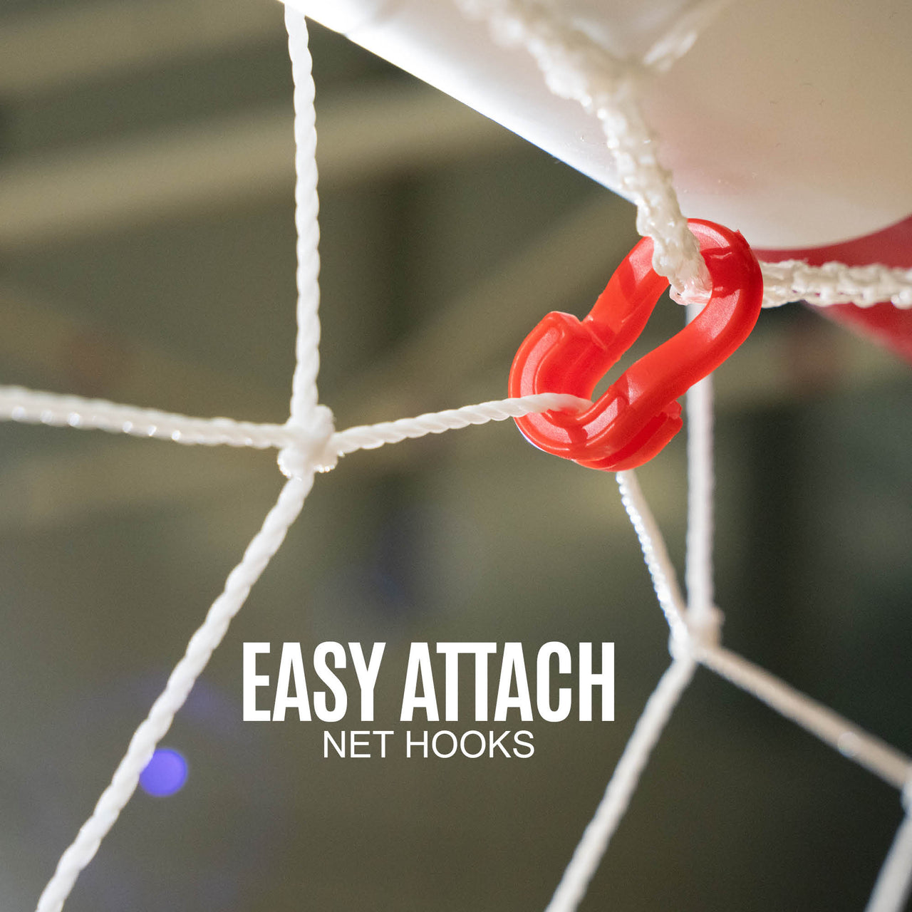 Red hook attached to a white sports net with 'Easy Attach Net Hooks' text.