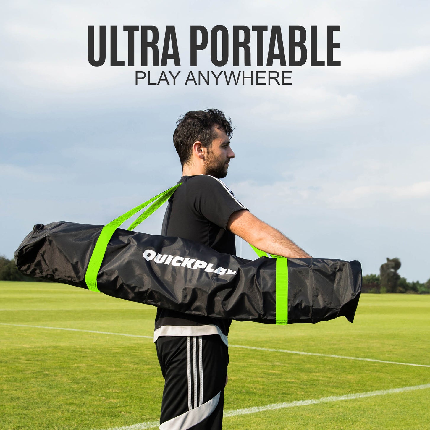 Man carrying the MEGA NET 12x9' in its black QUICKPLAY bag with green straps on his shoulder, with the text "Ultra portable, play anywhere".