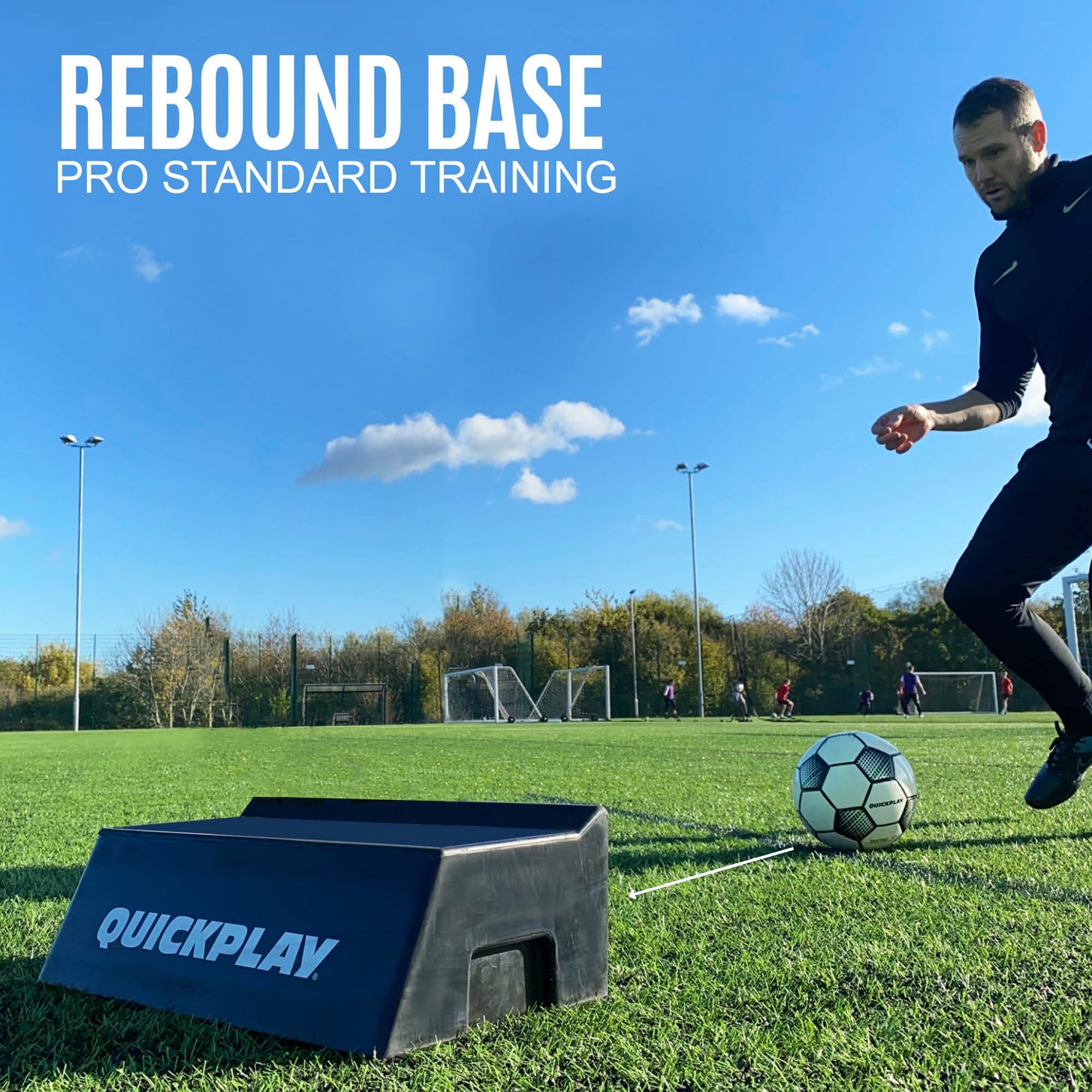 Player passing a ball towards the REPLAY Block on an artificial pitch, with the text "Rebound base".