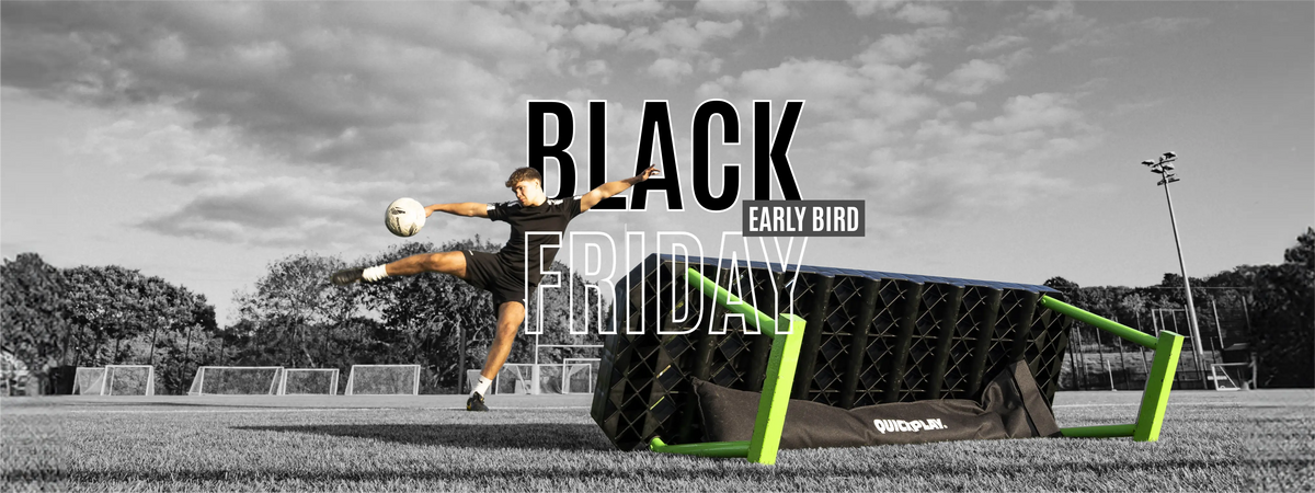 footballer shooting at a target net in a goal