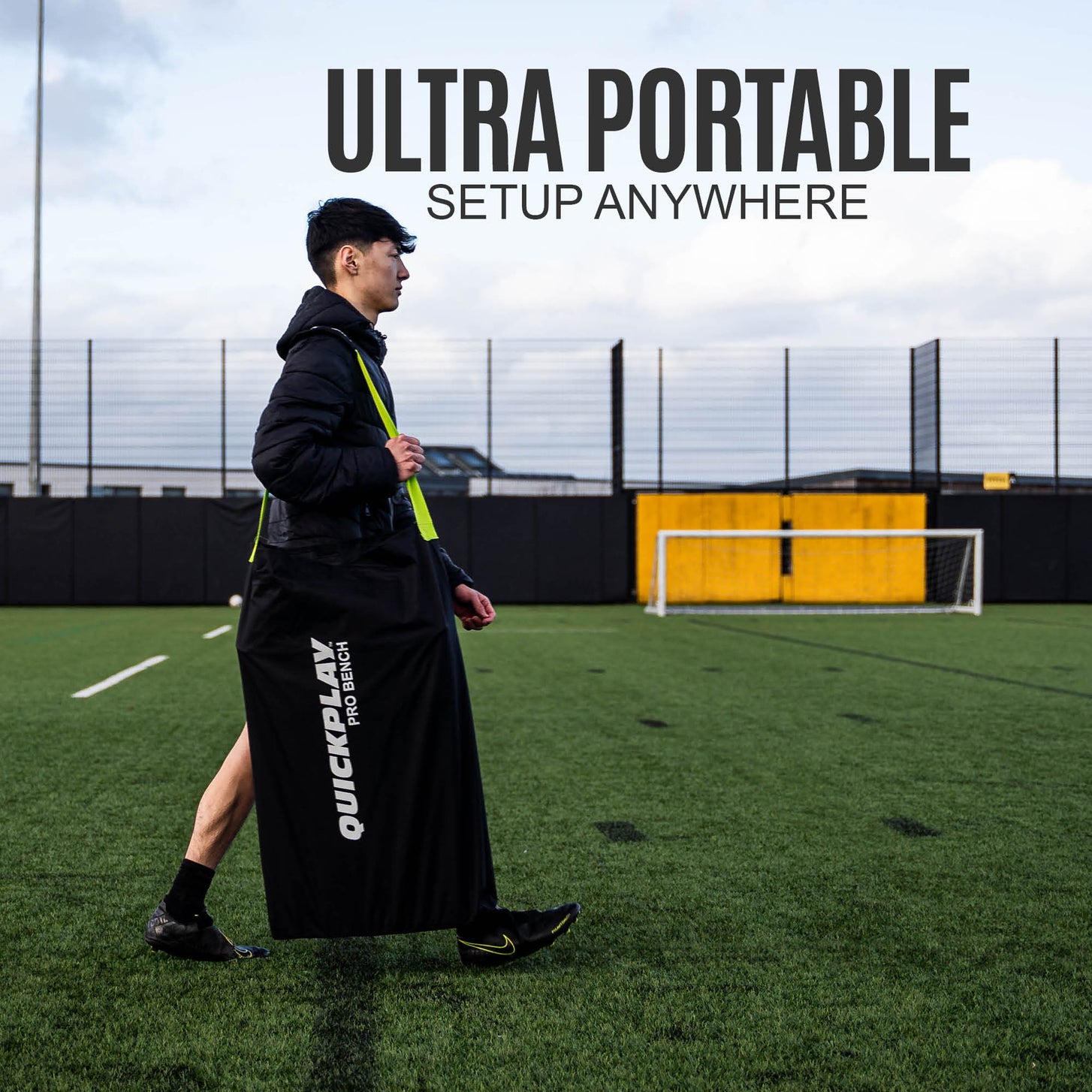 Player carrying the PRO Bench 4 seat in its black QUICKPLAY PRO Bench bag across a pitch, with the text "Ultra portable, setup anywhere".
