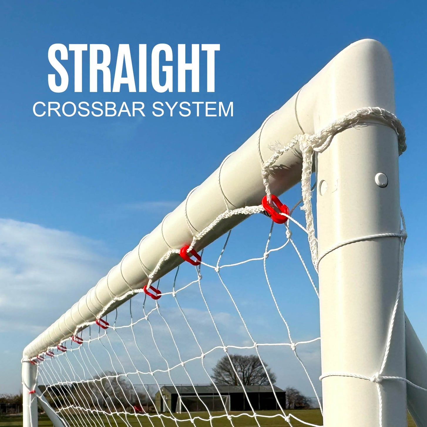 Football goal with 'Straight Crossbar System' text against a blue sky.