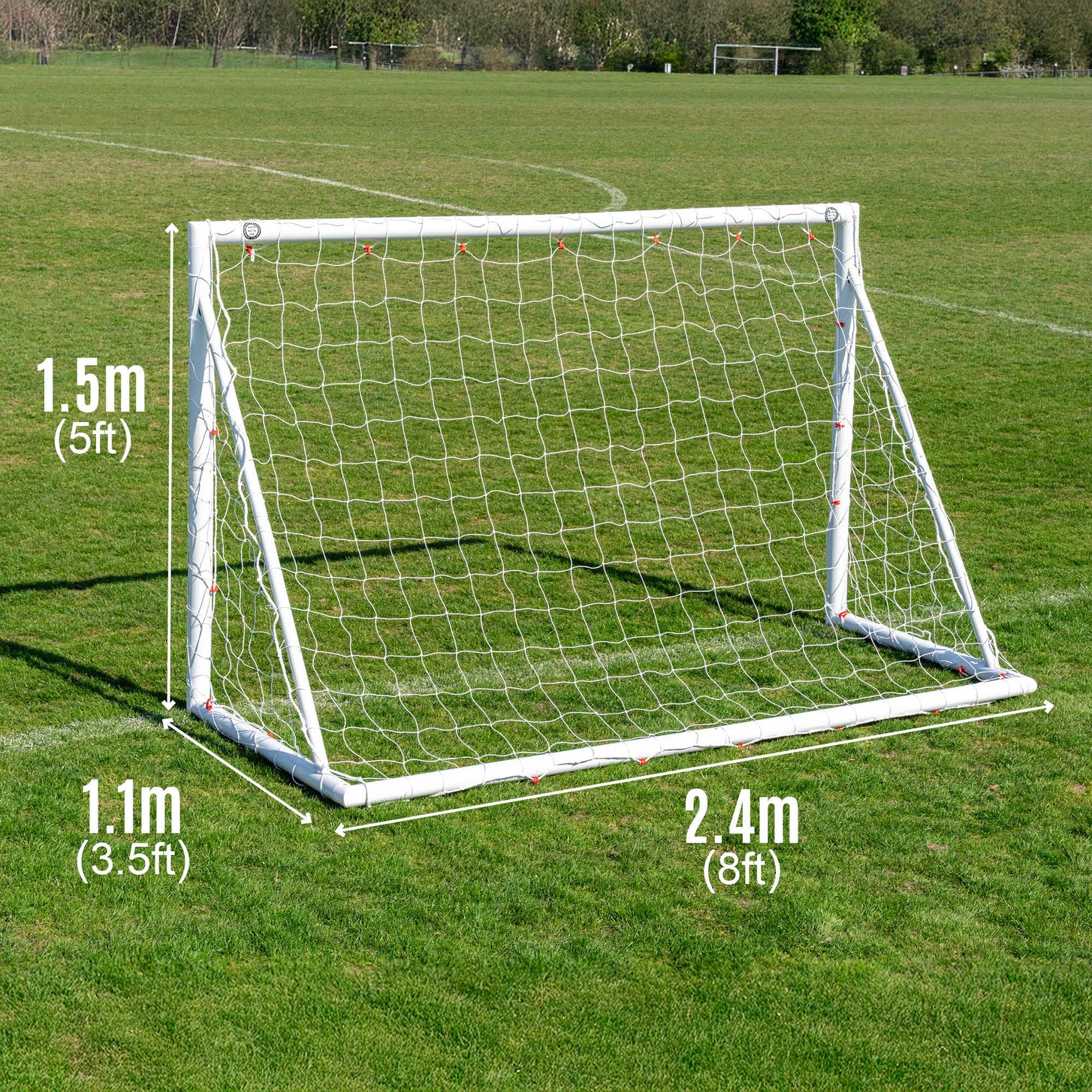 Q-FOLD 8x5' goal size chart on grass: 2.4m (8ft) wide, 1.5m (5ft) high and 1.1m (3.5ft) deep.
