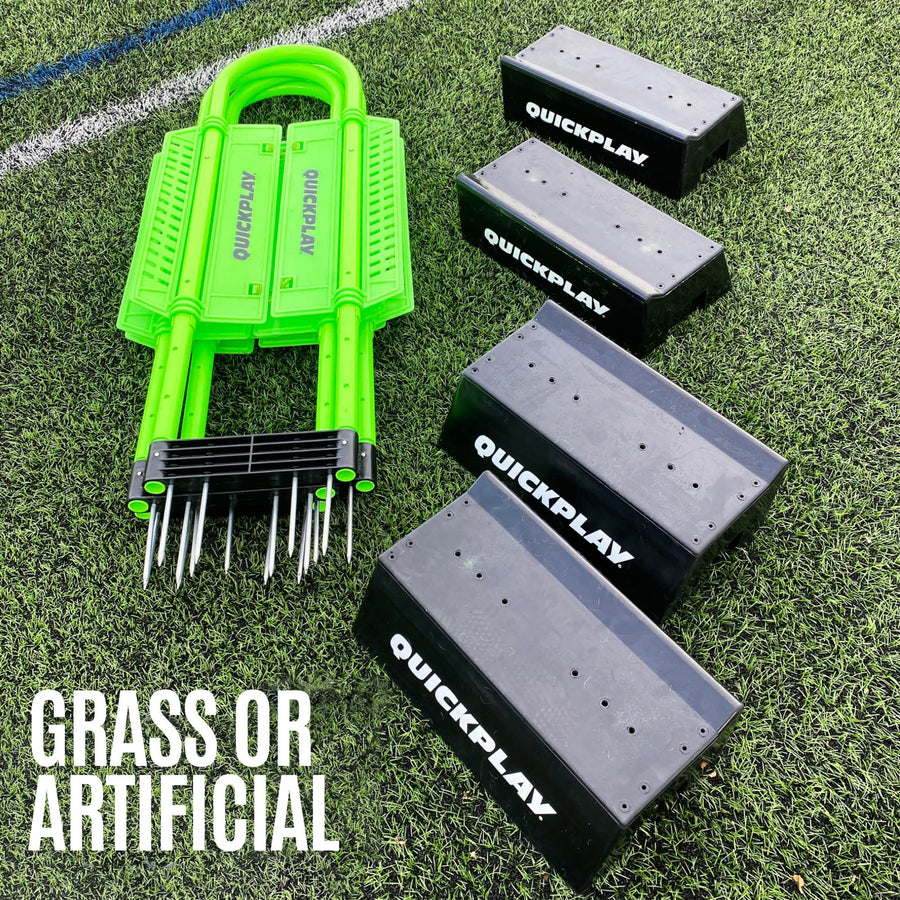 Folded green REPLAY Defender mannequin with metal spikes beside four black QUICKPLAY bases, with the text "Grass or artificial".