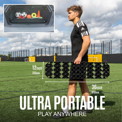 Person holding a portable football rebound board on a sports field with text 'Ultra Portable, Play Anywhere'.