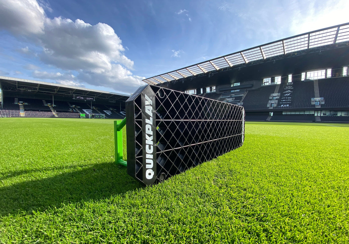 a replay station rebound board in a sunny stadium