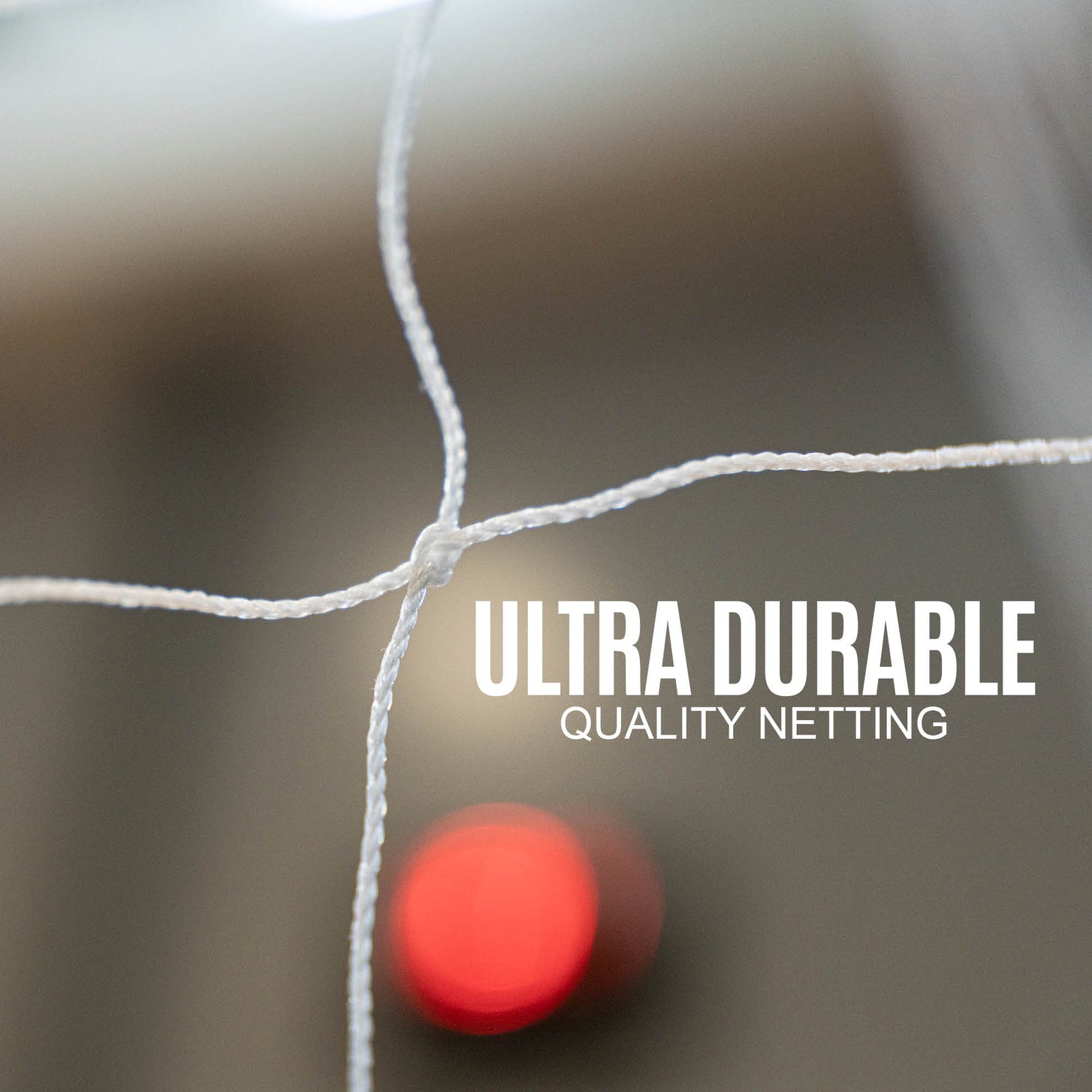 Portable Handball Goal Adult 3x2m netting close up showing a white knotted joint, with the text "Ultra durable quality netting".