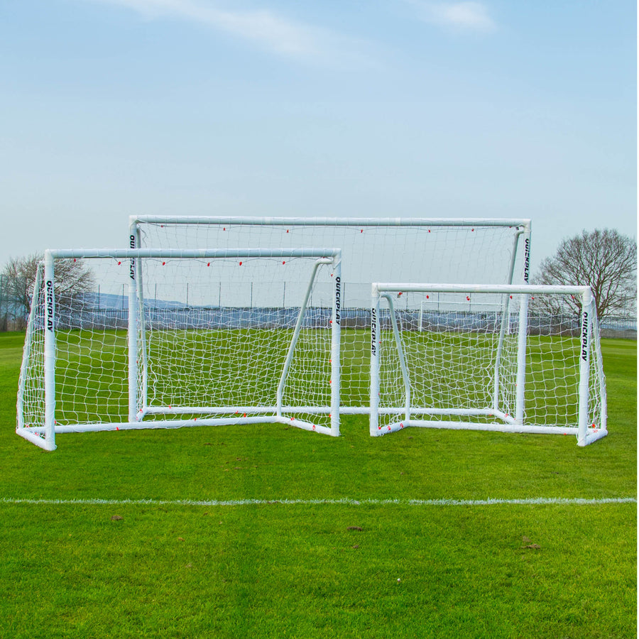 Q-FOLD Match 12x6' shown with two other Q-FOLD Match goal sizes on a grass field.