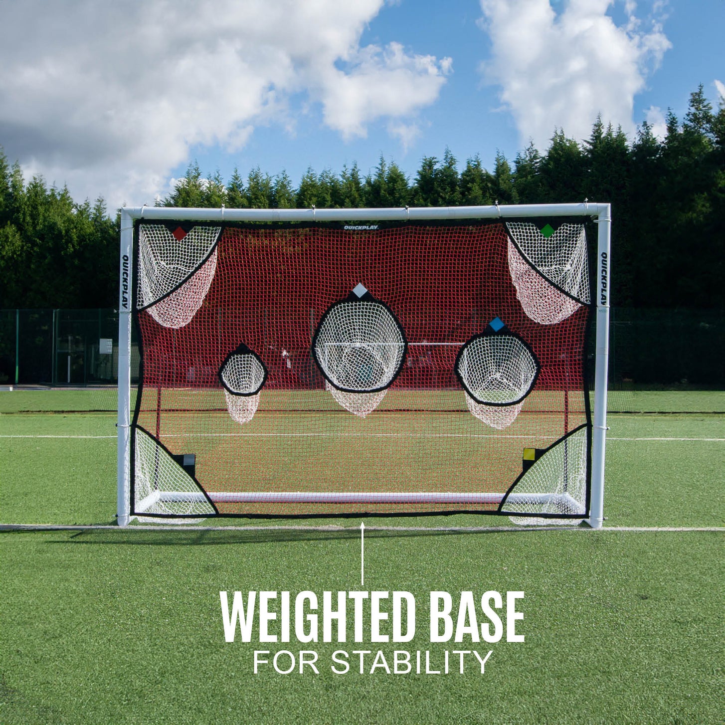 TARGET Net 3x2m fitted to a white goal, seen from the front on an artificial pitch, with the text "Weighted base for stability".