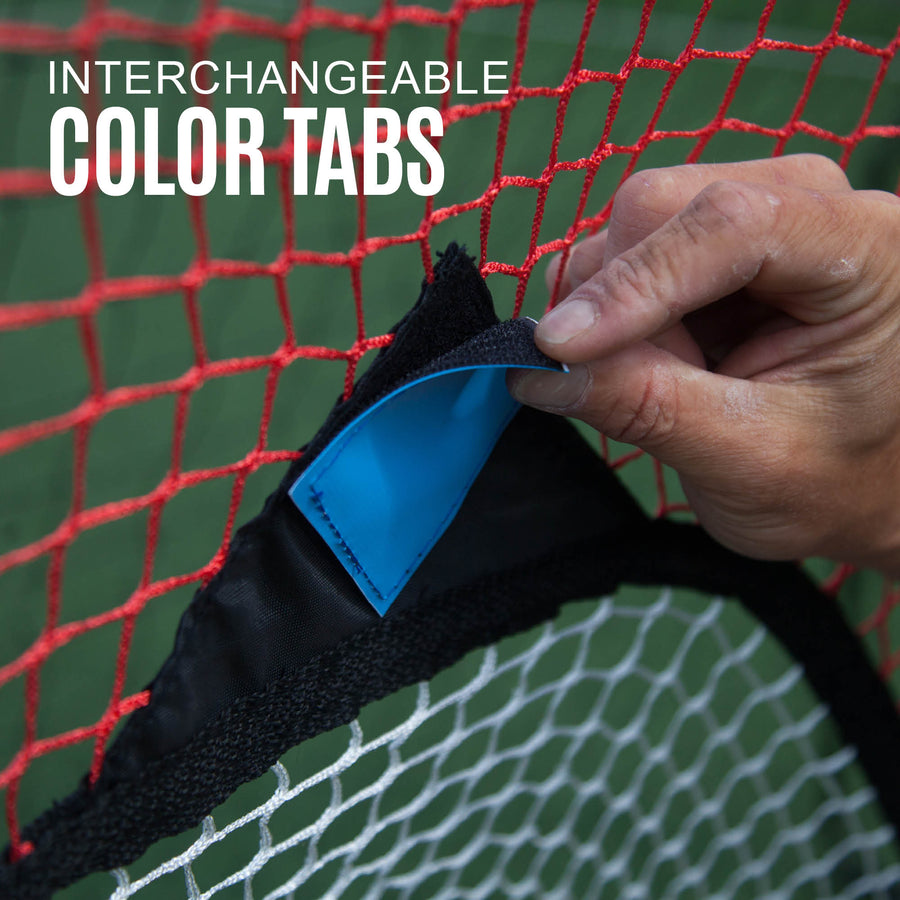 TARGET Net 3x2m close up of a hand fitting a blue tab to a pocket, showing the interchangeable colour tabs.