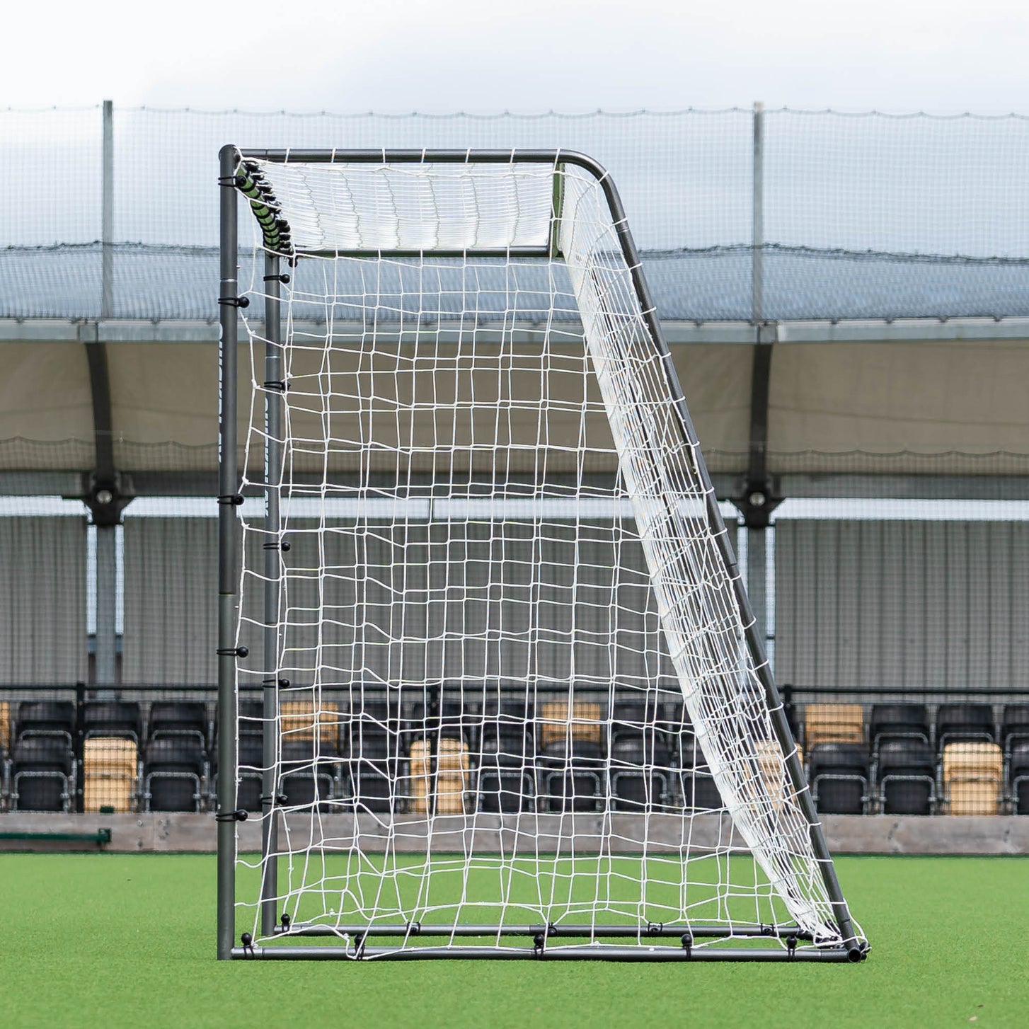 GS Series Football Goal 12x6' side view showing the black frame and the white net held out at the back.