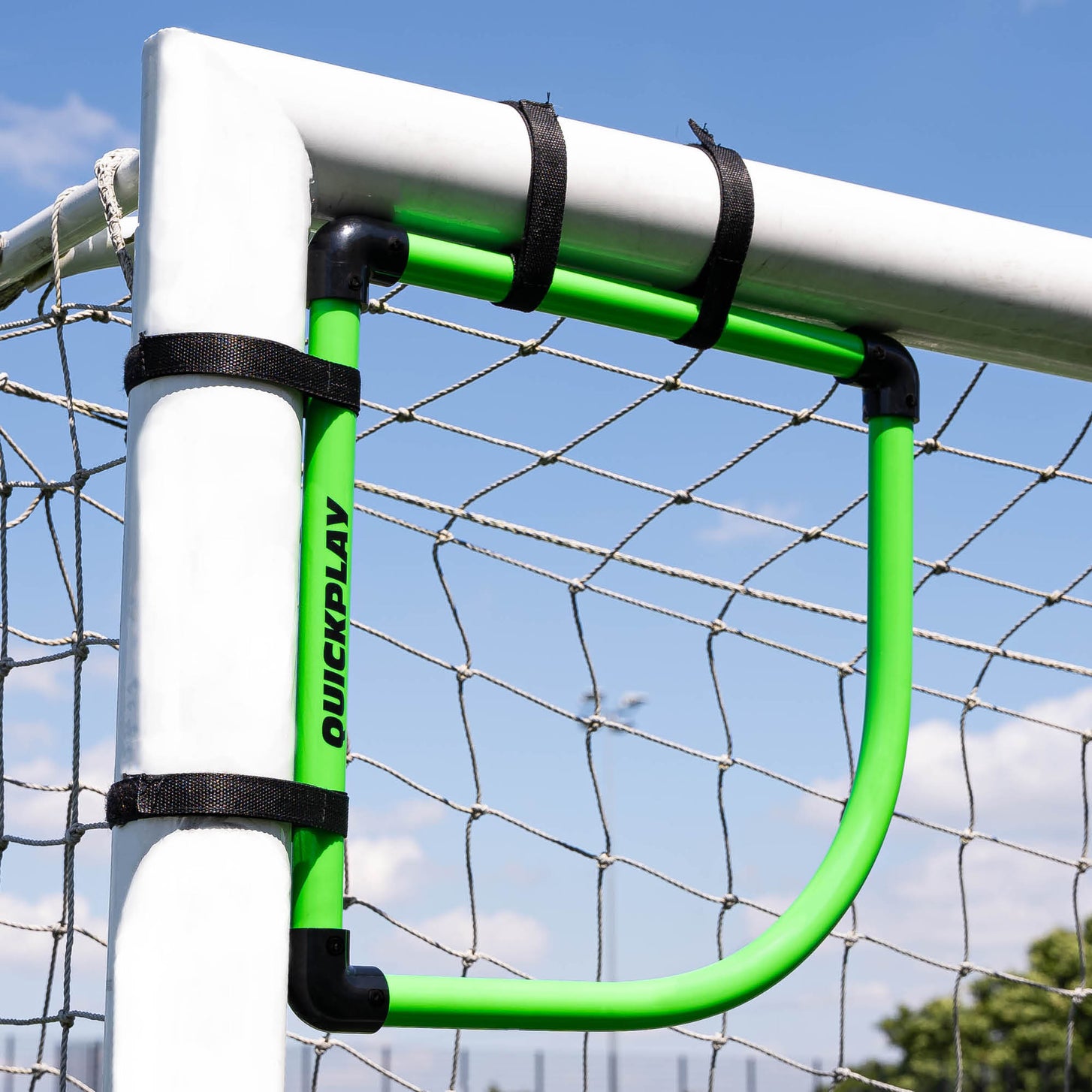 Goal Corner Target Frame fixed with black straps in the top corner of a goal, seen from the other side.