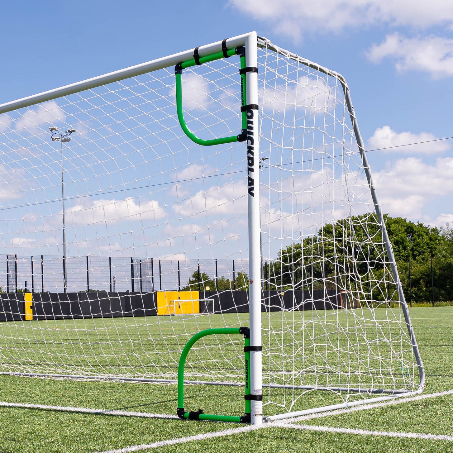 Goal Corner Target Frames fitted in the top and bottom corners of a white goal on an artificial pitch.