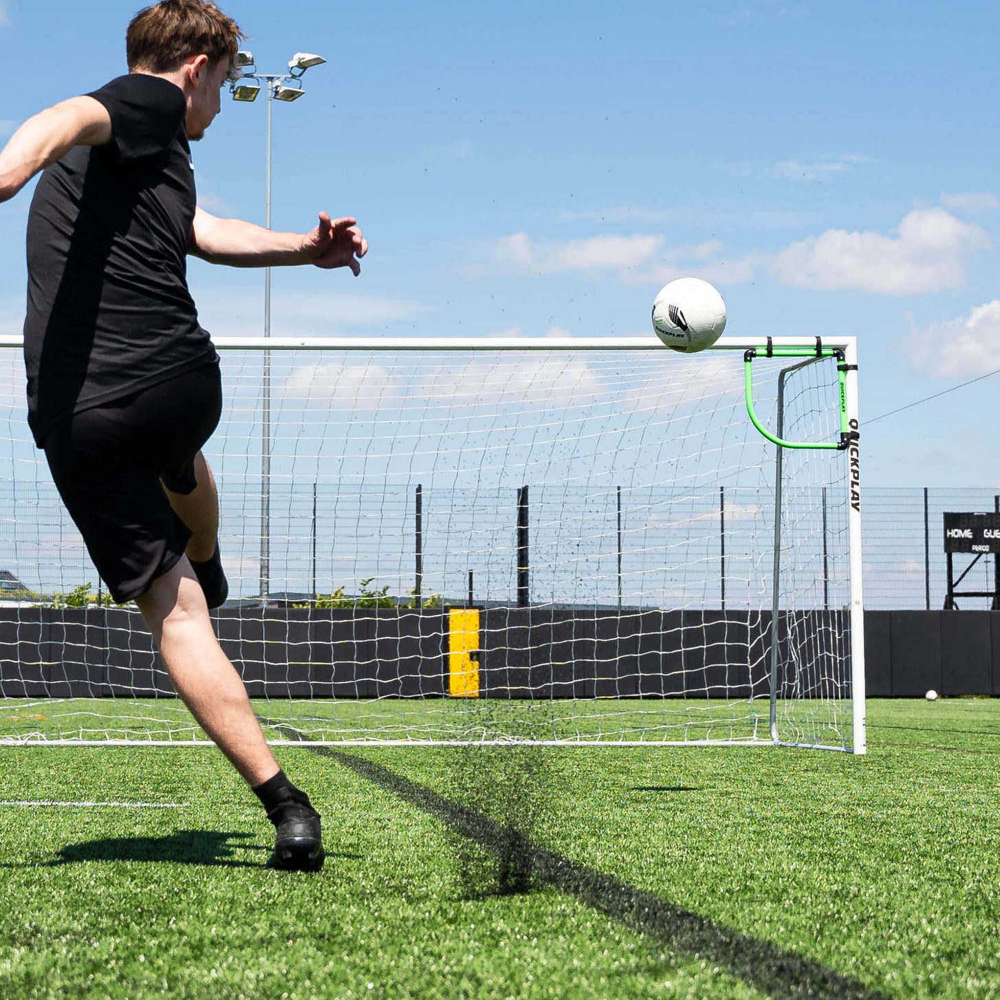 Player shooting at a goal with a Goal Corner Target Frame in the top corner as the ball flies towards it.