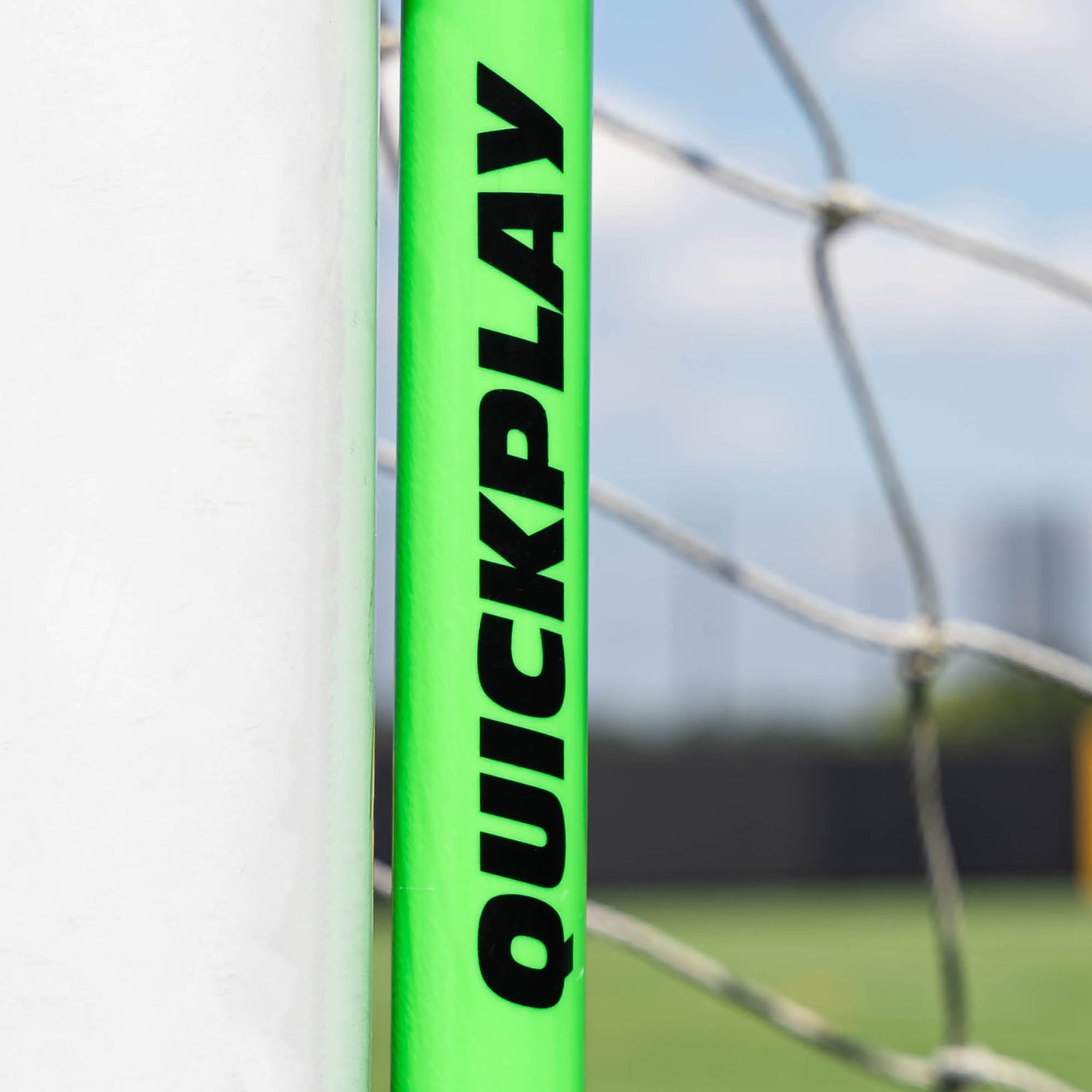 Goal Corner Target Frame green tube close up with the QUICKPLAY logo next to a white goal post.