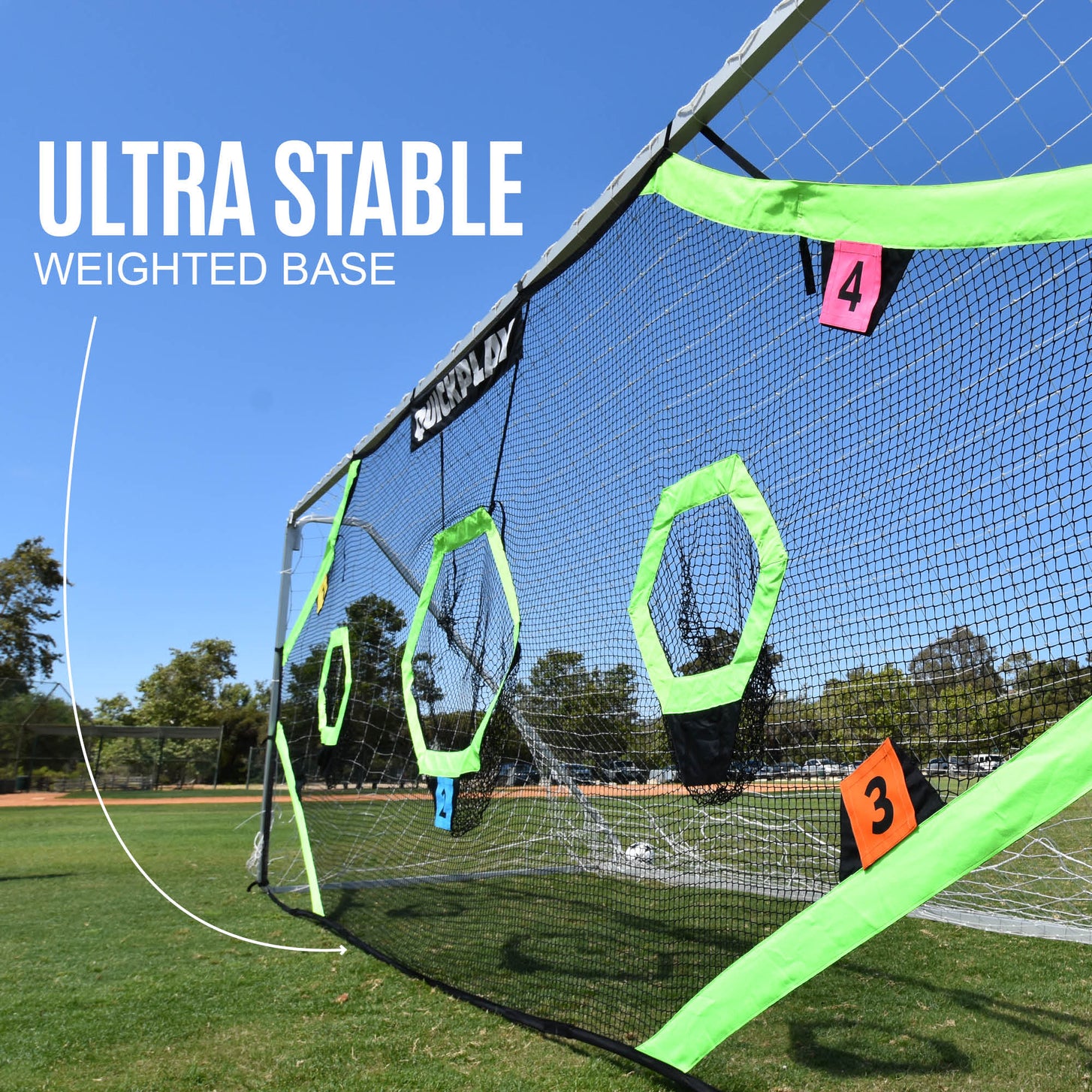 TARGET Net Pro 24x8' target net seen from the side with its base lying on the grass, with the text "Ultra stable weighted base".