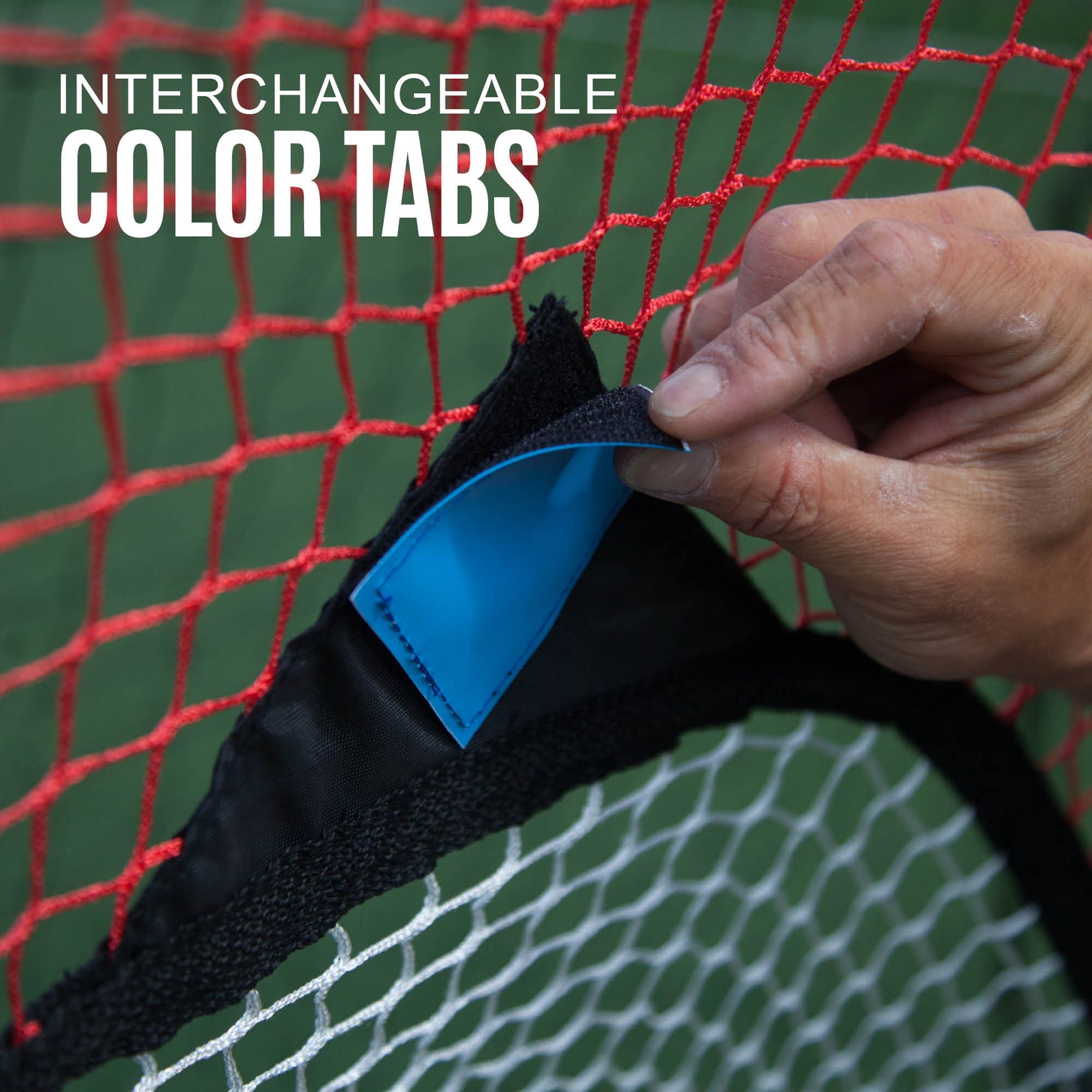 TARGET Net 12x6' close up of a hand lifting a blue tab on a pocket, with the text "Interchangeable colour tabs".