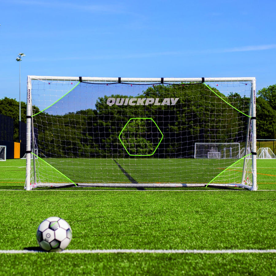 Front view of the TARGET Net Lite 6x4' on a white goal on an artificial pitch, with a ball in the foreground.
